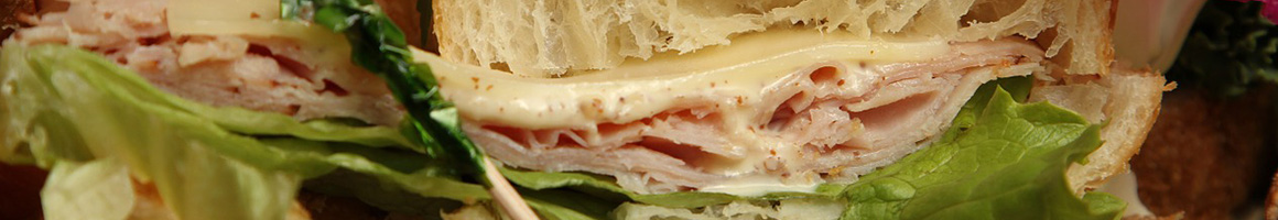 Eating Sandwich at Sandwich Man restaurant in Harrisburg, PA.